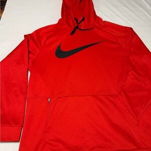 Nike Bright Red Pullover with Black Swoosh few stains in the pictures .